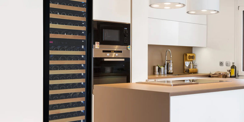 A luxuriously spacious wine cooler integrated into a modern kitchen