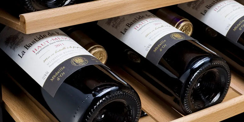 Wooden shelves securely holding a collection of wines