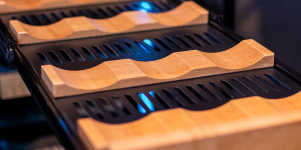 Specially-designed Flexcount shelving with indentations to cradle precious wines